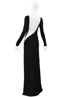 PUCCI BLACK JERSEY EVENING GOWN WITH CUTOUT AND GOLD CHAINS